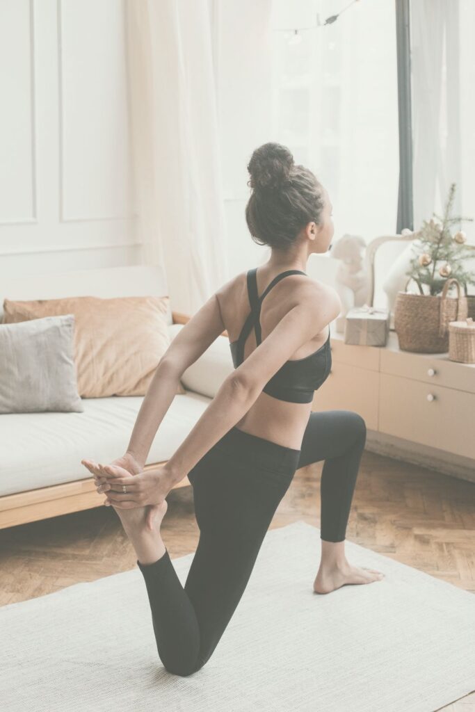 woman stretching for a productive day